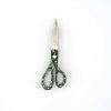 Floral scissors in a closed position - interactive pin badge