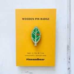 Lead wooden pin badge