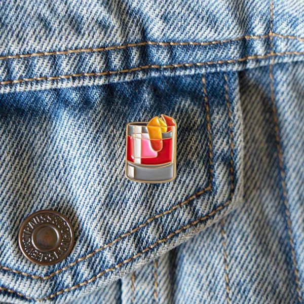 Negroni pin badge on denim jacket