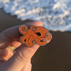Orange octopus pin badge