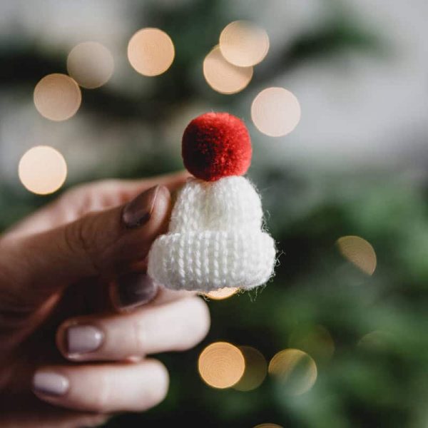 white knitted christmas bobble hat brooch