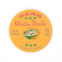 Wonton noodle brooch on a menu backing card