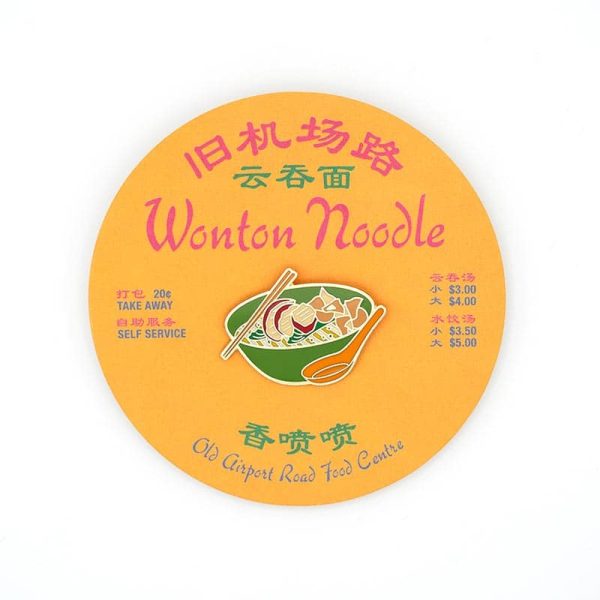 Wonton noodle brooch on a menu backing card